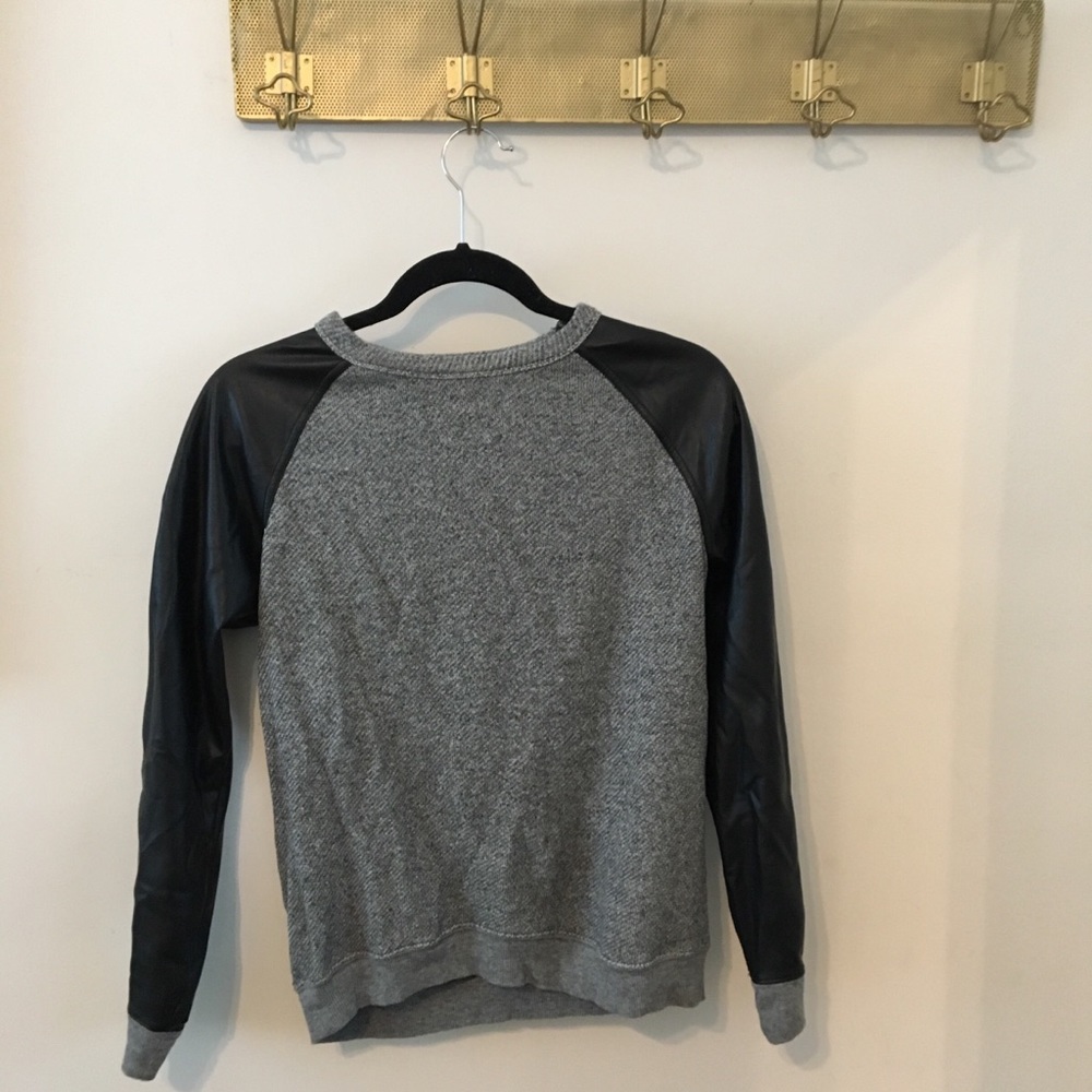 Gray sweatshirt with black faux leather sleeves